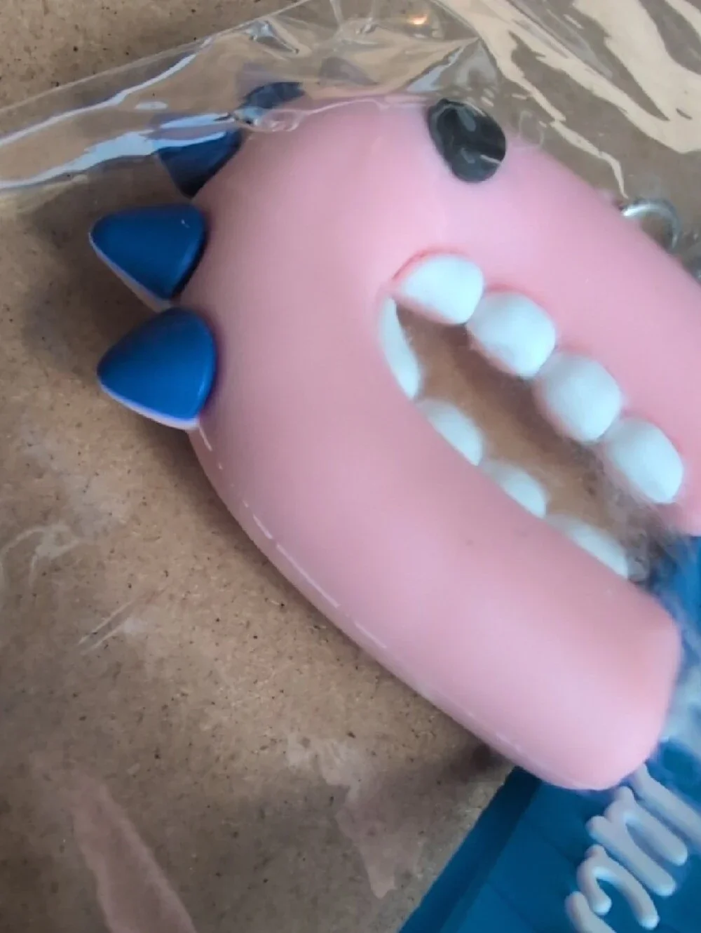 Pink Dino Keychain Charm with Blue 'Good Luck' Strap